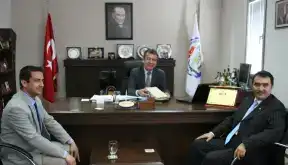 İLÇE MÜFTÜSÜ MİTSO BAŞKANINA KURAN ARMAĞAN ETTİ